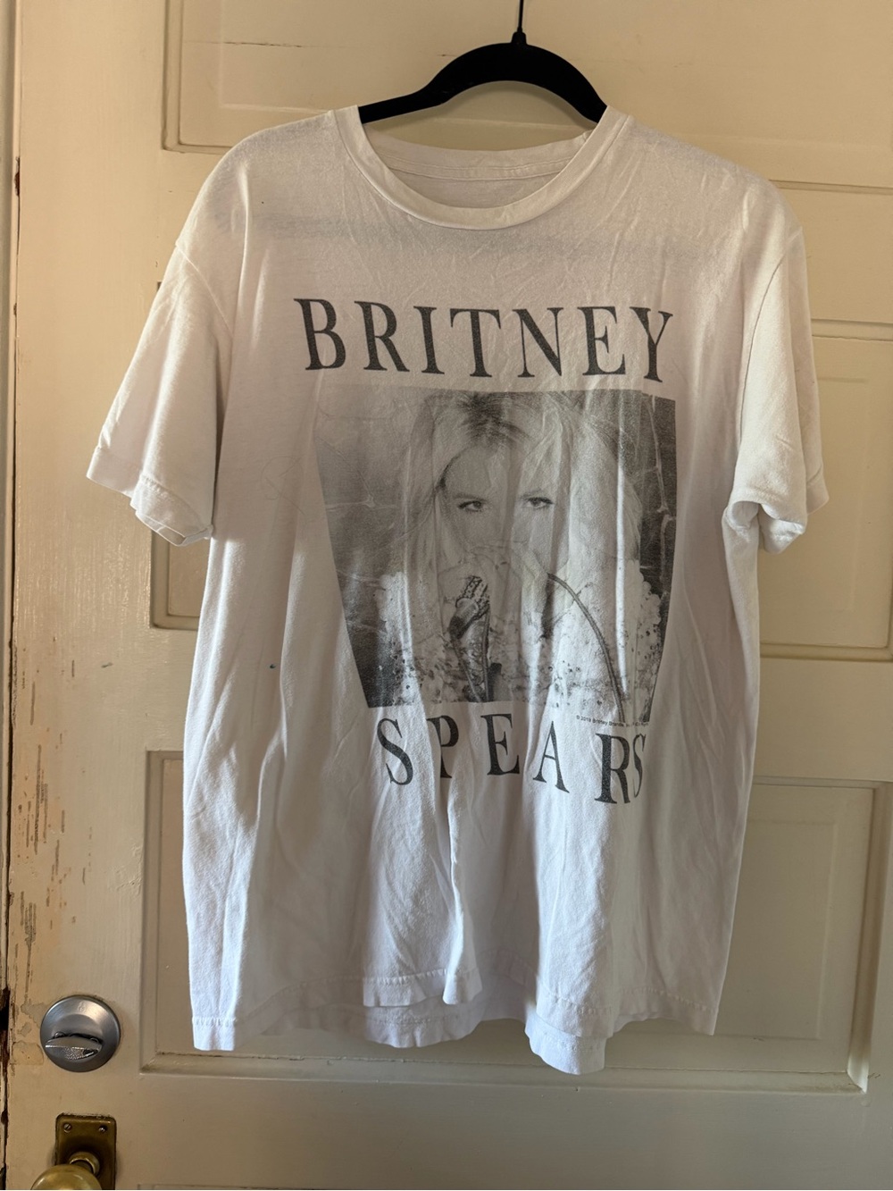 White, black, and grey Britney Spears t-shirt, size medium.